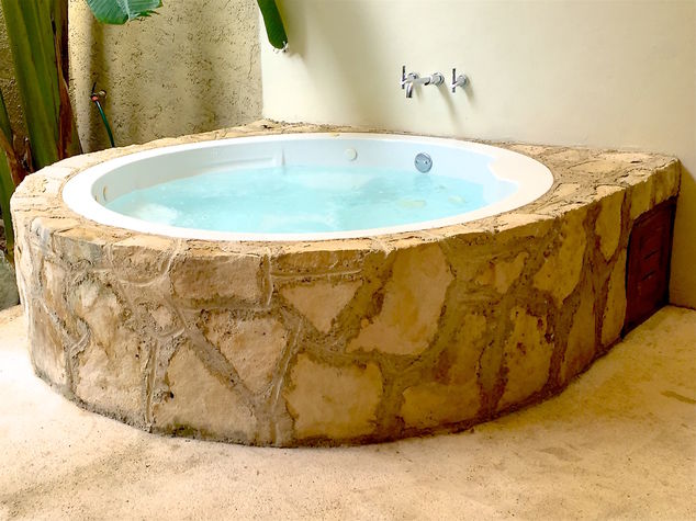 The terrace is home to a sparkling jacuzzi