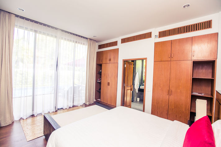 Light Master suite featuring large built-in wardrobe