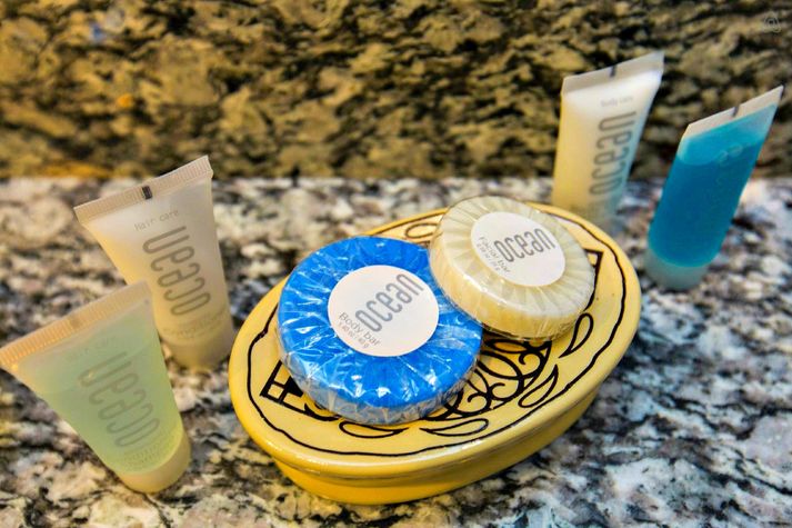 Guests receive designer bathroom amenities.