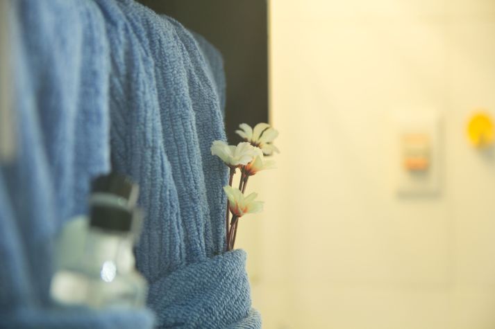 Shared bathroom with stand shower, hot water, and super soft towels