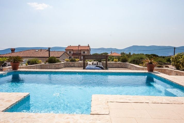 Heated pool with counter flow for endless swimming.