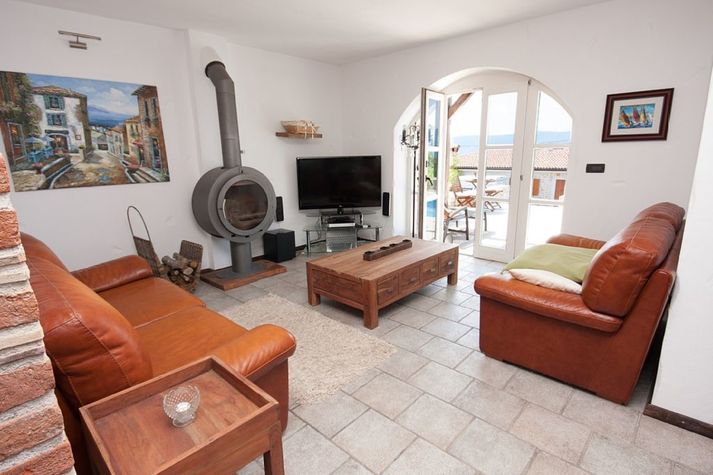LED TV, fireplace and cosy sofas are a guarantee