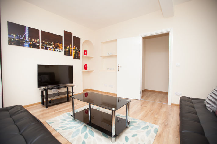 Living Room with TV, Glass Coffee Table, x2 Double
