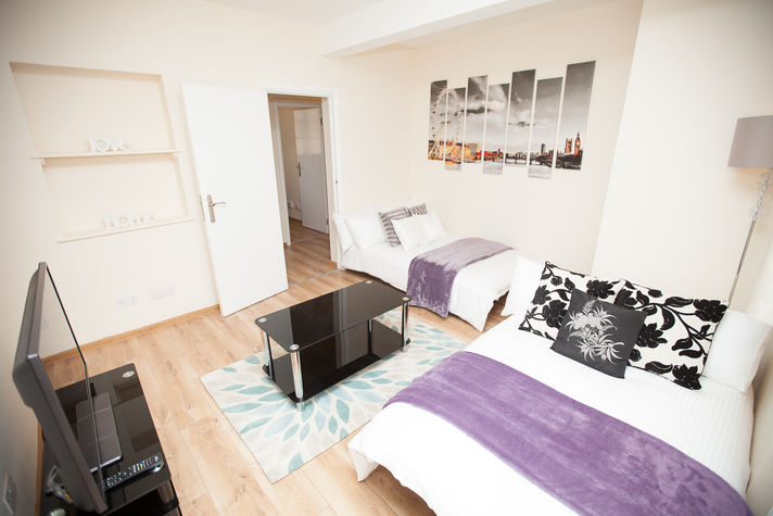 Living Room with x2 Double Sofa Beds