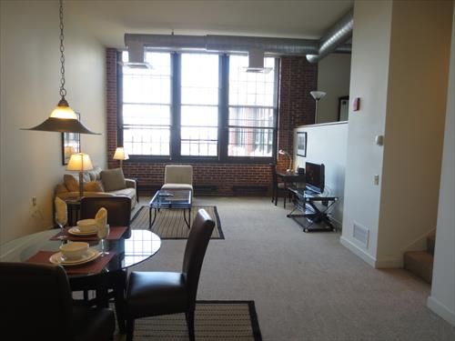 Beautiful loft apartment with high ceilings and over-sized industrial style windows