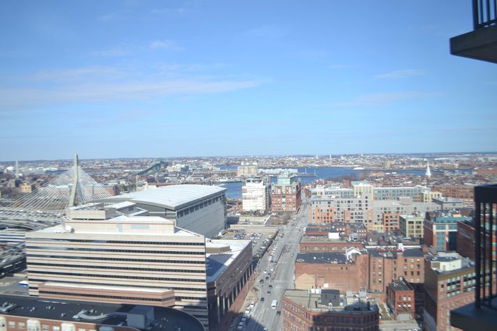 See the Zakim Bridge, TD Bank North Garden, the West End, Boston Harbor, Chelsea and the Tobin Bridge