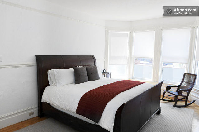 2nd Bedroom with King bed, rocking chair, dresser