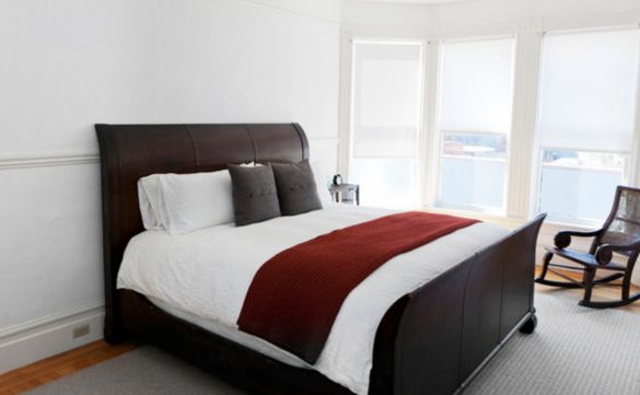 2nd Bedroom with King bed, rocking chair, dresser