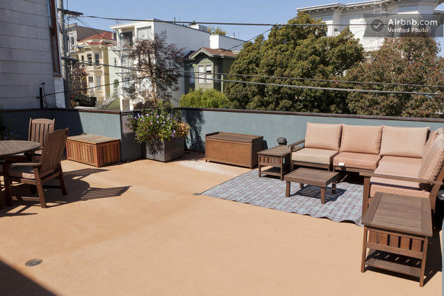 700 square foot deck with electric BBQ, seating, sun