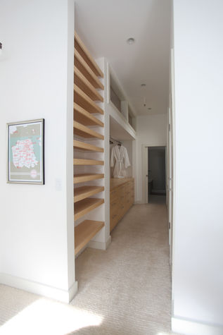 Master closet with luxurious bathrobes for your comfort