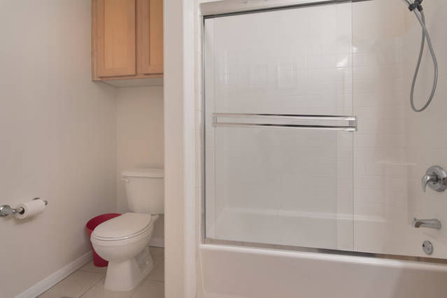 Stand up, clear glass shower enclosures