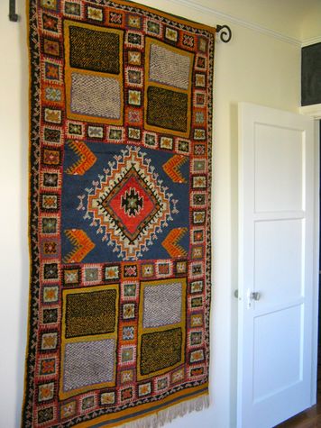 Antique Moroccan rug brings vibrant color to the 2nd bedroom