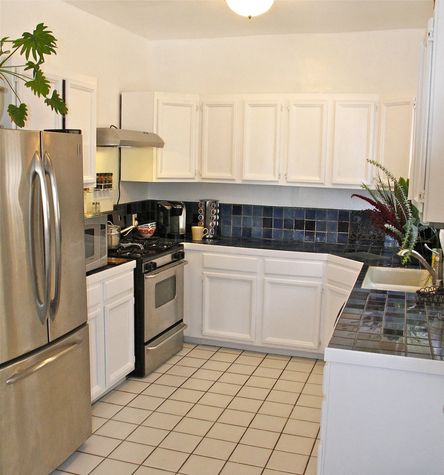 Well appointed kitchen with stainless steel appliances