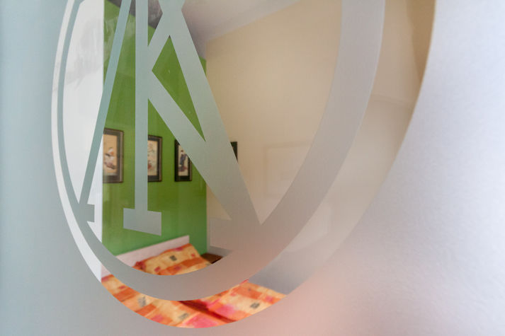 The glass slide door to the chinese bedroom