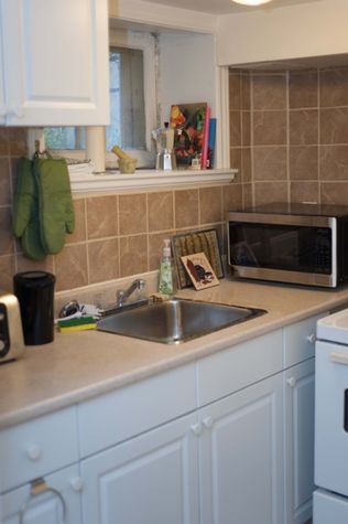 Microwave, toaster, European coffeemaker, kettle - this kitchen's got it all!