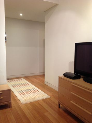 Entrance to master bedroom, with en suite dressing room to left