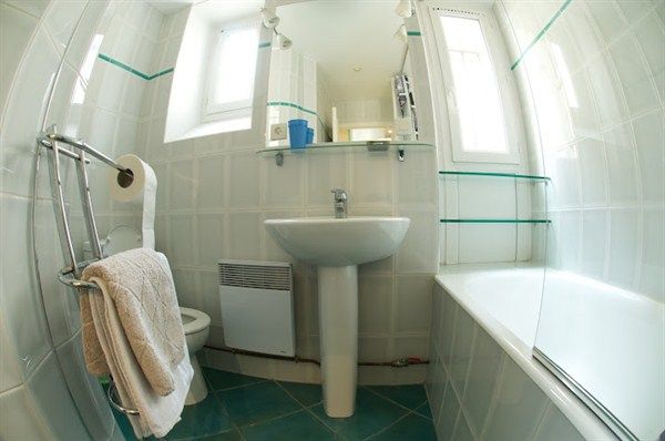 Bathroom with bathtub.