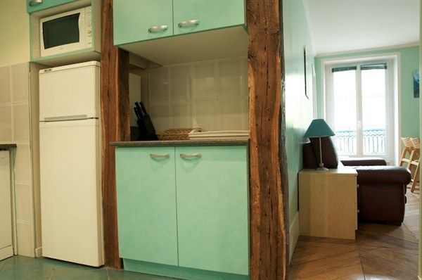 View of the kitchen leading to the living room.