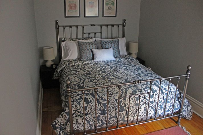 The master bedroom with its queen-sized bed.
