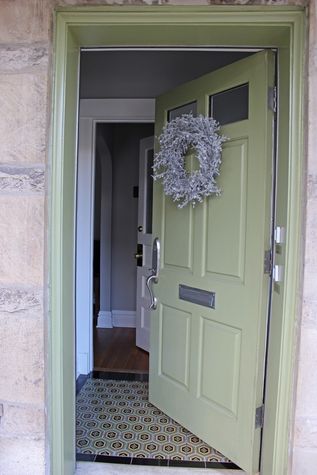 Entry way and (locking) door into the 1st floor unit. For safety the porch and foyer lights are always on.