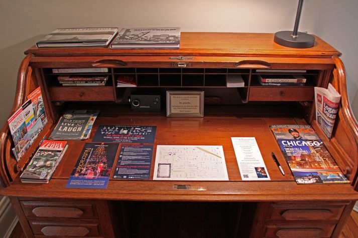 Close-up of the desk showing all of the travel information at your fingertips.