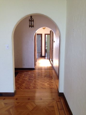 Entry hallway with beautiful hardwood floors