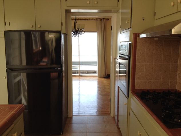 Kitchen looking toward den and ocean view