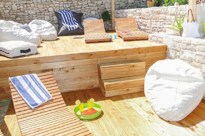 Relax in new lounge area next to the pool.