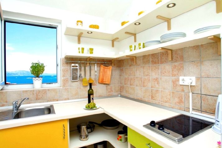 Fall in love with the sea from the kitchen window while preparing the salad...