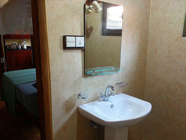 The ground floor en-suite twin bathroom