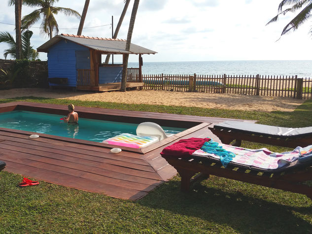 The beachfront garden with swimming pool and our 'sundowner' snack hut