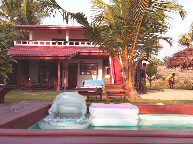 The beach house viewed from in front of the pool
