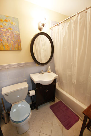 Full Bath with Tub, Shower, Toilet, and Vanity