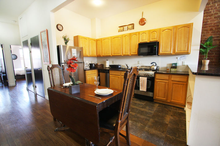 Stainless Steel Kitchen with Stove, Microwave, Dishwasher, and Full-sized refrigerator