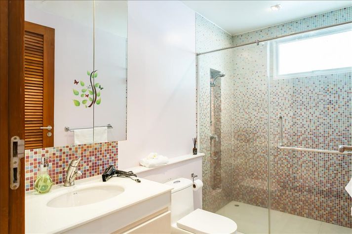 Bathroom with shower and hair dryer
Bathroom with shower and hair dryer