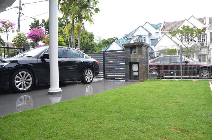 The green adjacent to the car porch ...