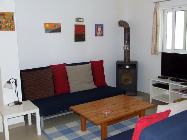 The Lounge area with a Wood burning stove for the cooler months. All wood is provided