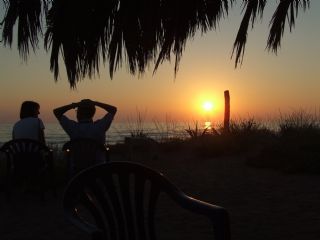 Relax on the beach as the Sun goes down