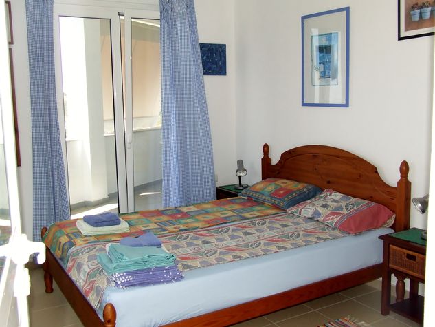 Bedroom 2 with direct access to the Sea facing veranda. This bedroom also has its own Entrance door if needed.