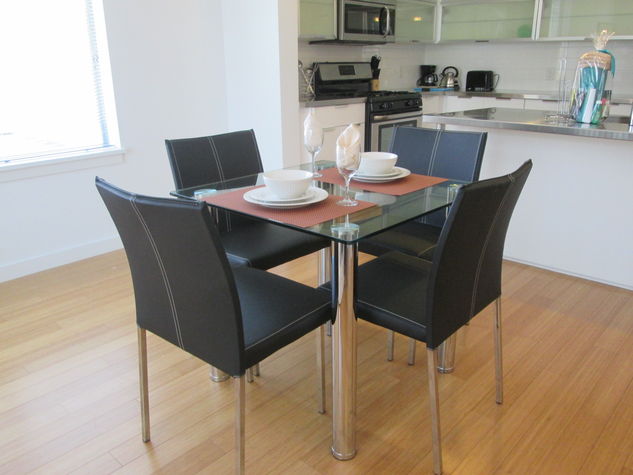 Dining area with seating for four where you can dine in comfort