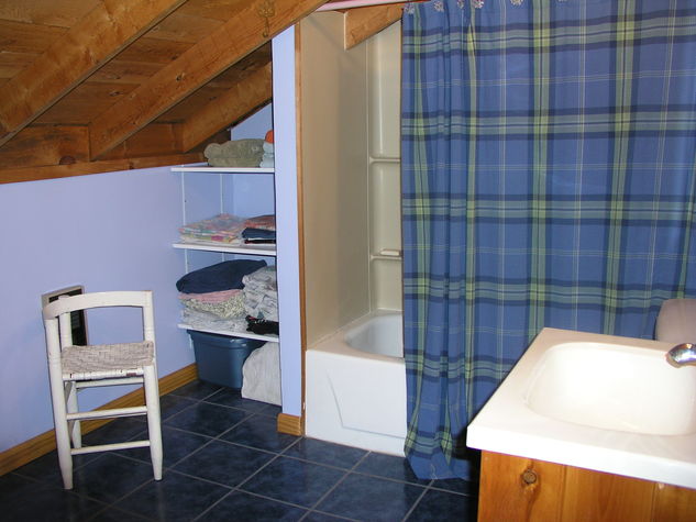 Master bedroom has its own bath.