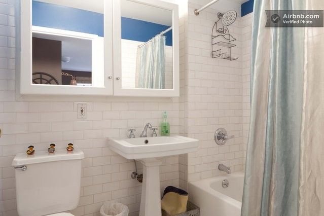 Full bathroom with tub