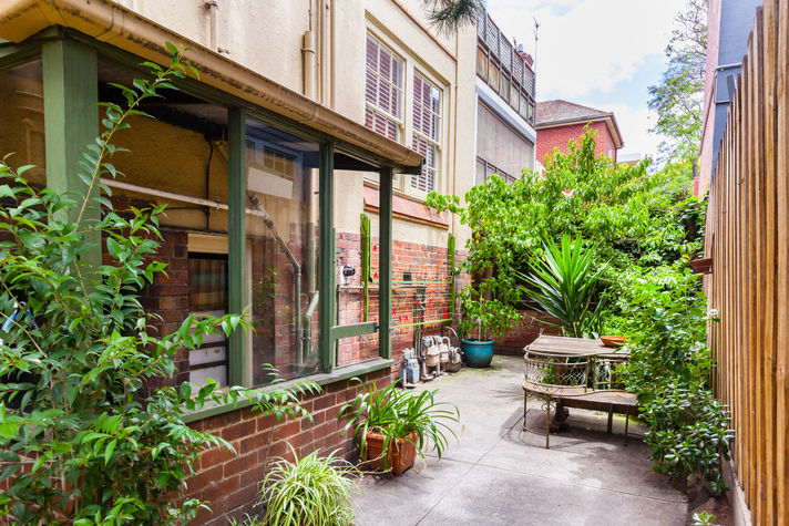 Outdoor sitting area with clothes line