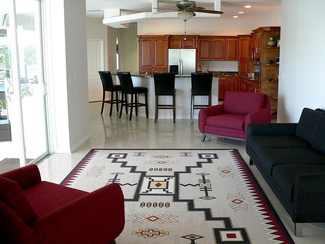 living area, looks out onto pool and lake