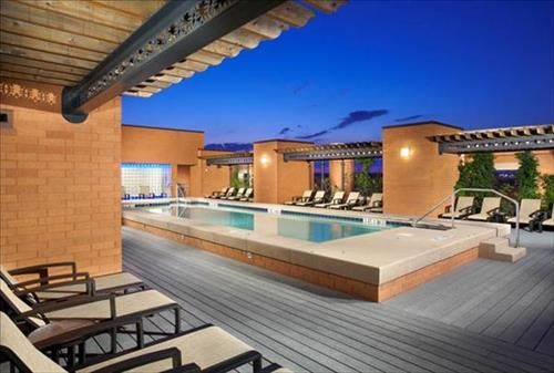Enjoy a swim or just relax on a chaise lounge chair at the pool on our roof