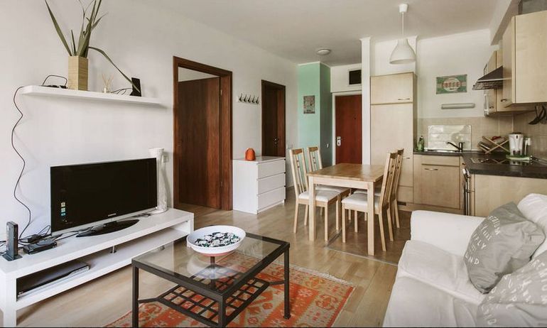 Livingroom with open plan kitchen