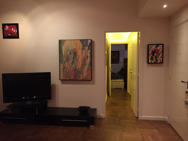 Corridor leading from living room to bedrooms and master bathroom