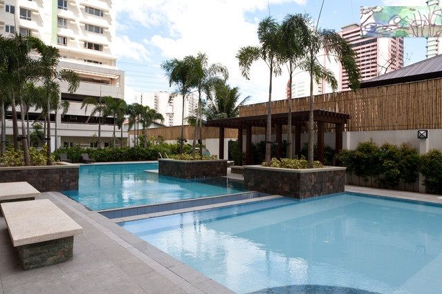 DE-STRESS by enjoying a dip in the pool with the property's tropic landscaping after a full-on day!