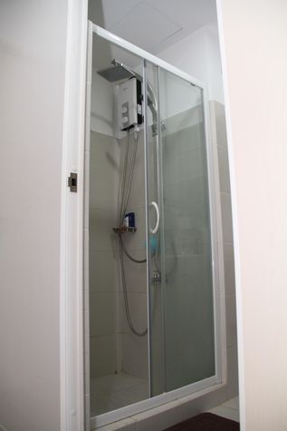 Bathroom with shower glass enclosure