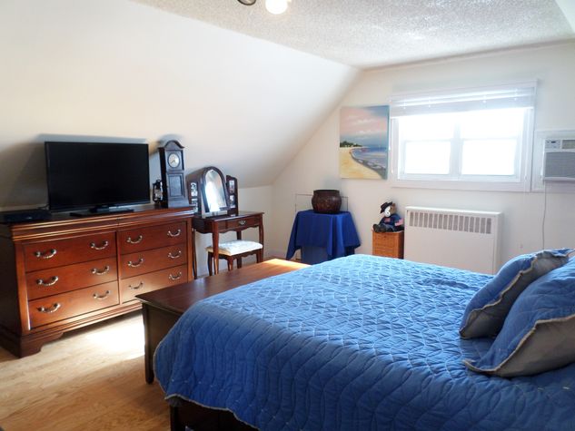 Large room has HD TV, with an Amazon fire stick for watching movies